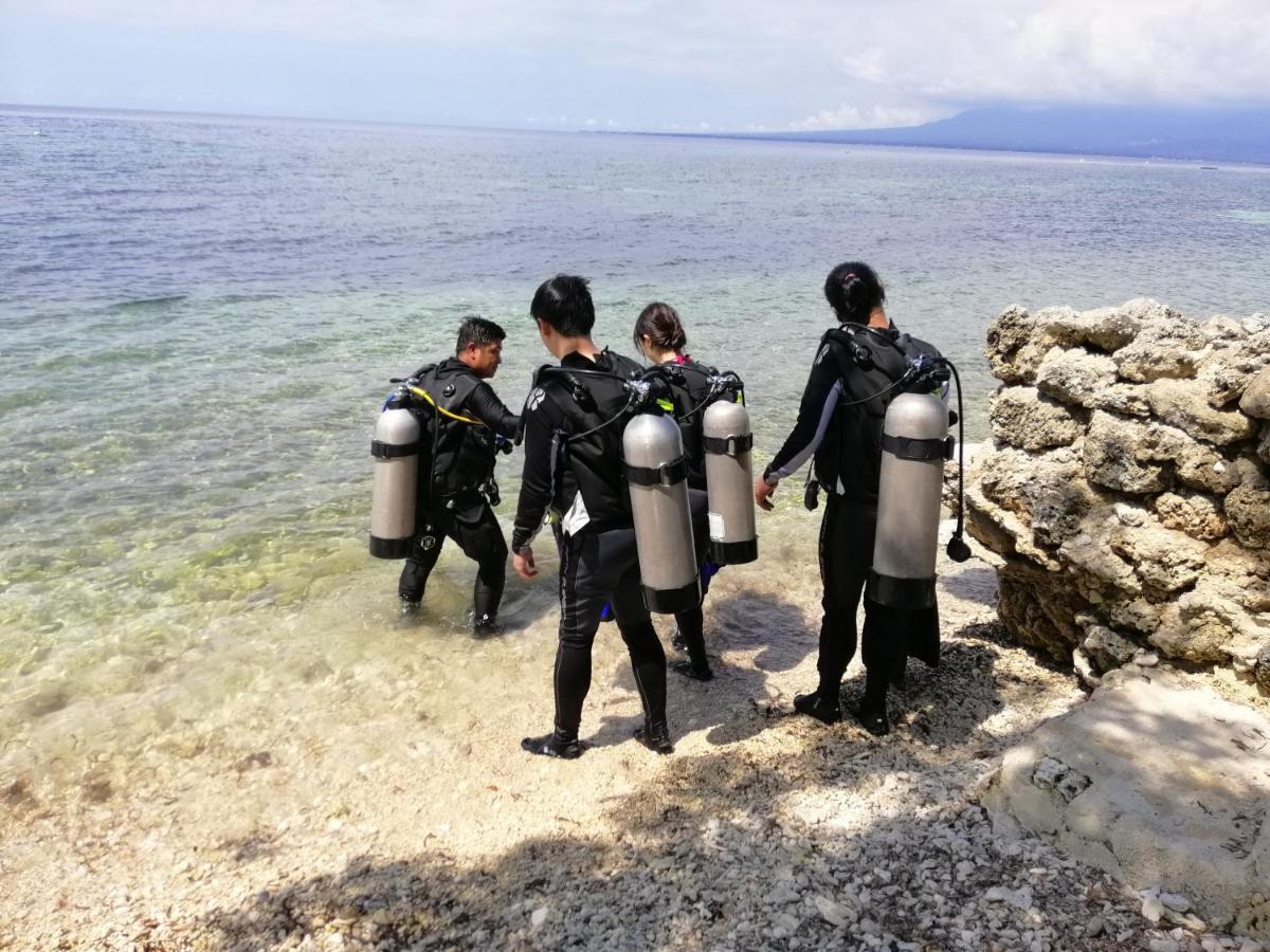 Southseas Beach Resort And Dive Center Santander Exteriör bild
