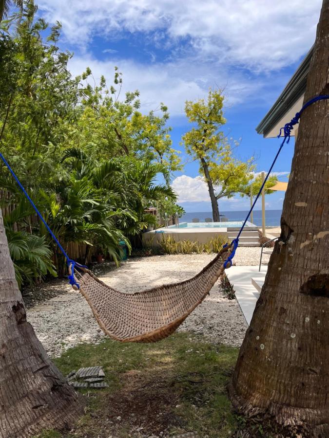 Southseas Beach Resort And Dive Center Santander Exteriör bild