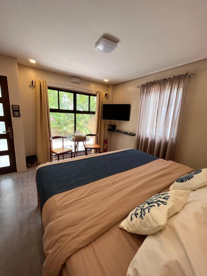 Southseas Beach Resort And Dive Center Santander Exteriör bild