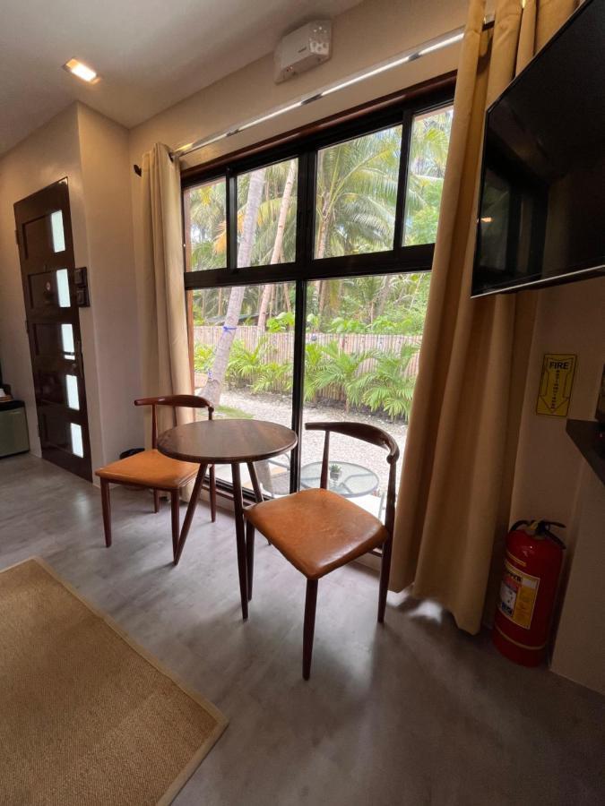 Southseas Beach Resort And Dive Center Santander Exteriör bild