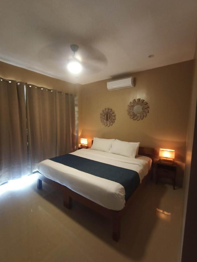 Southseas Beach Resort And Dive Center Santander Exteriör bild