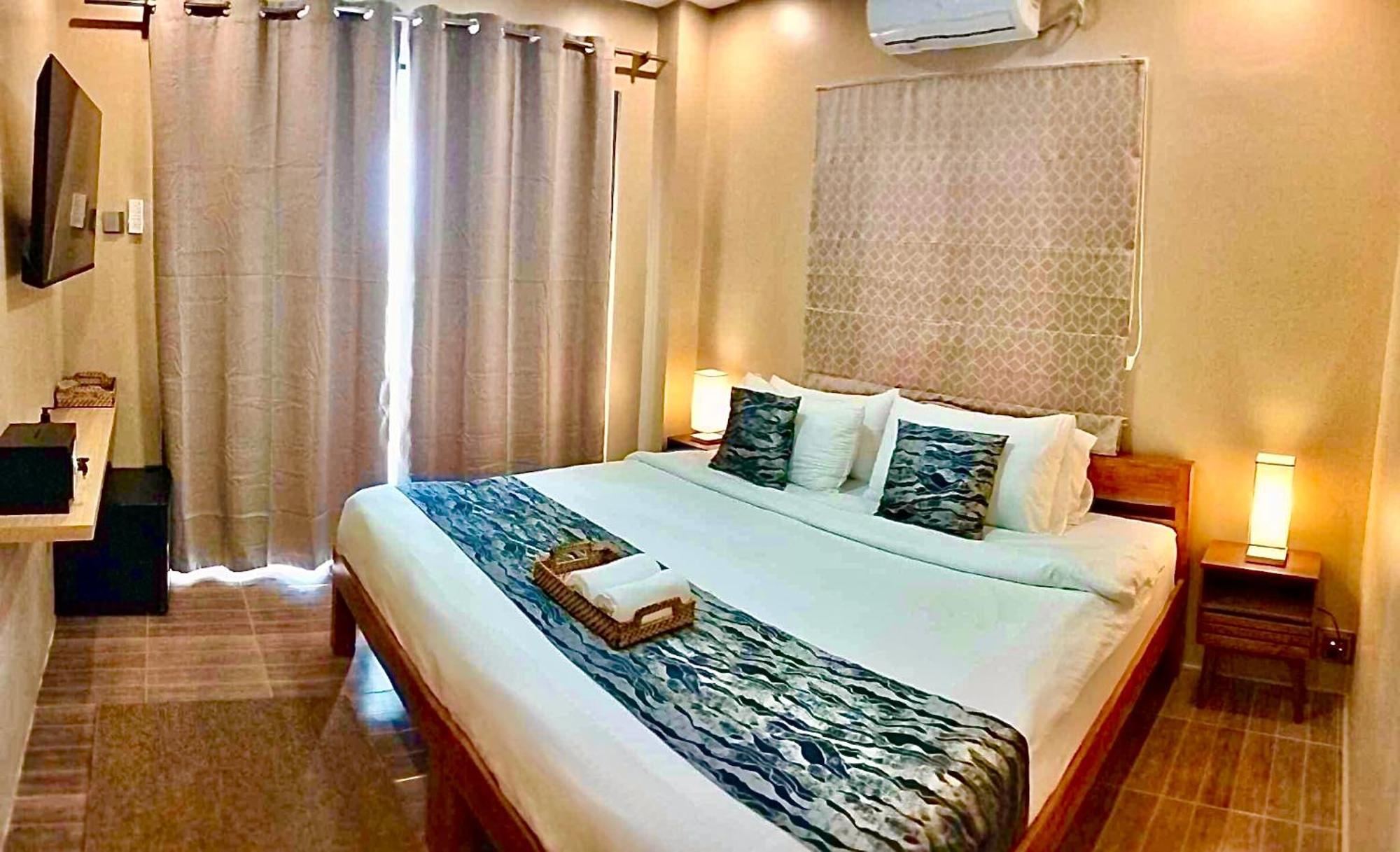 Southseas Beach Resort And Dive Center Santander Exteriör bild